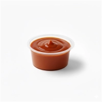 Zachtzoete en pittige currysaus (Oliehoorn, 50 mL bakje).